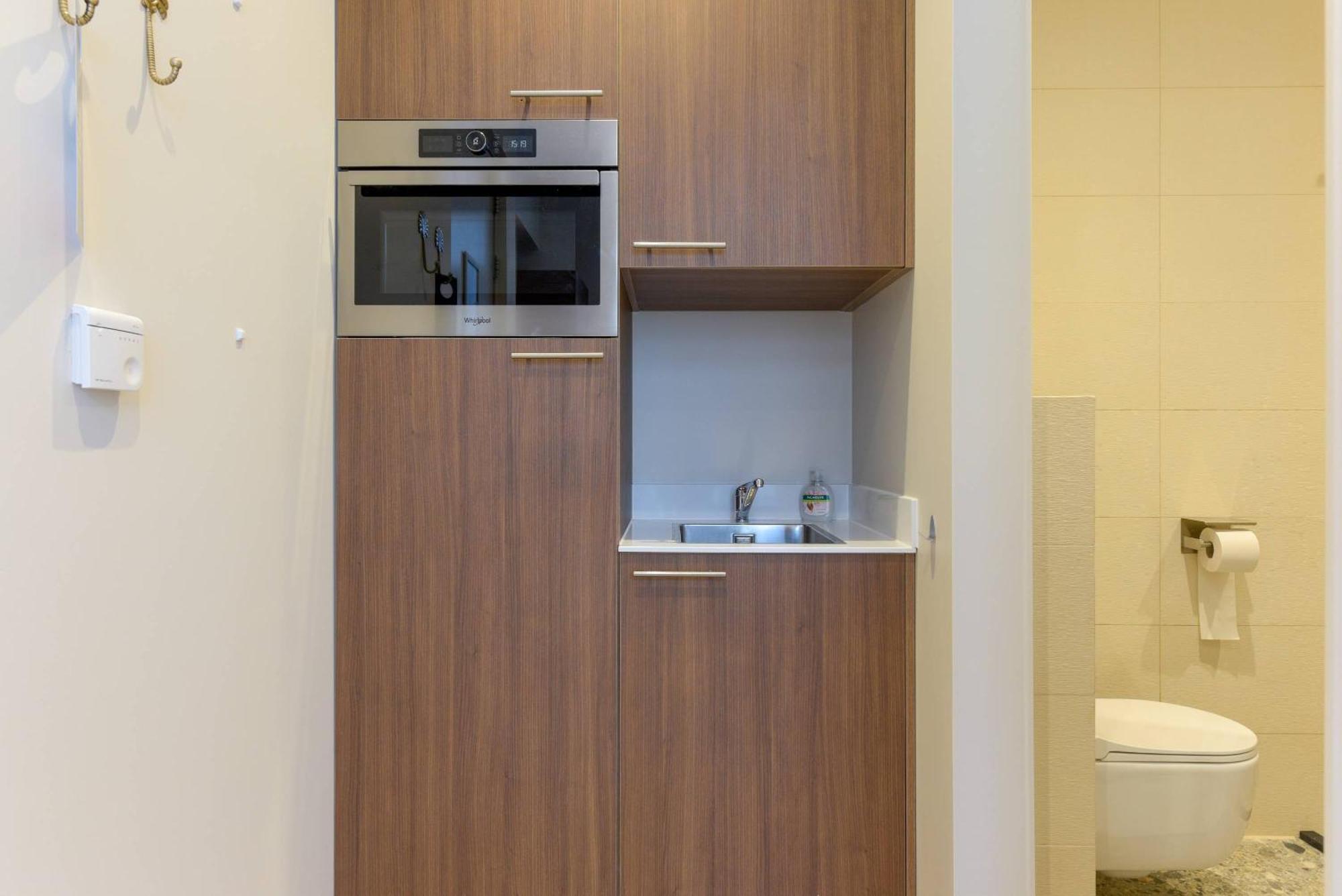 With Single Beds And Balcony *