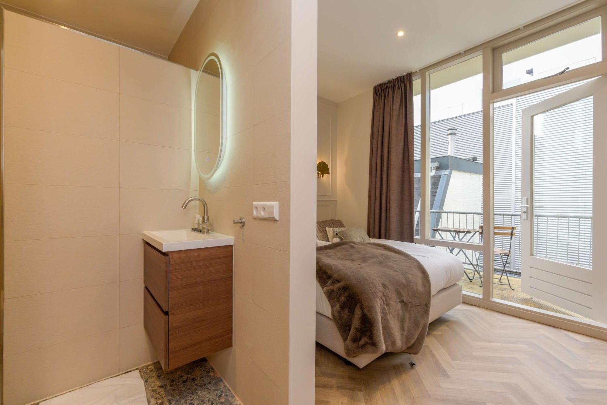 With Single Beds And Balcony