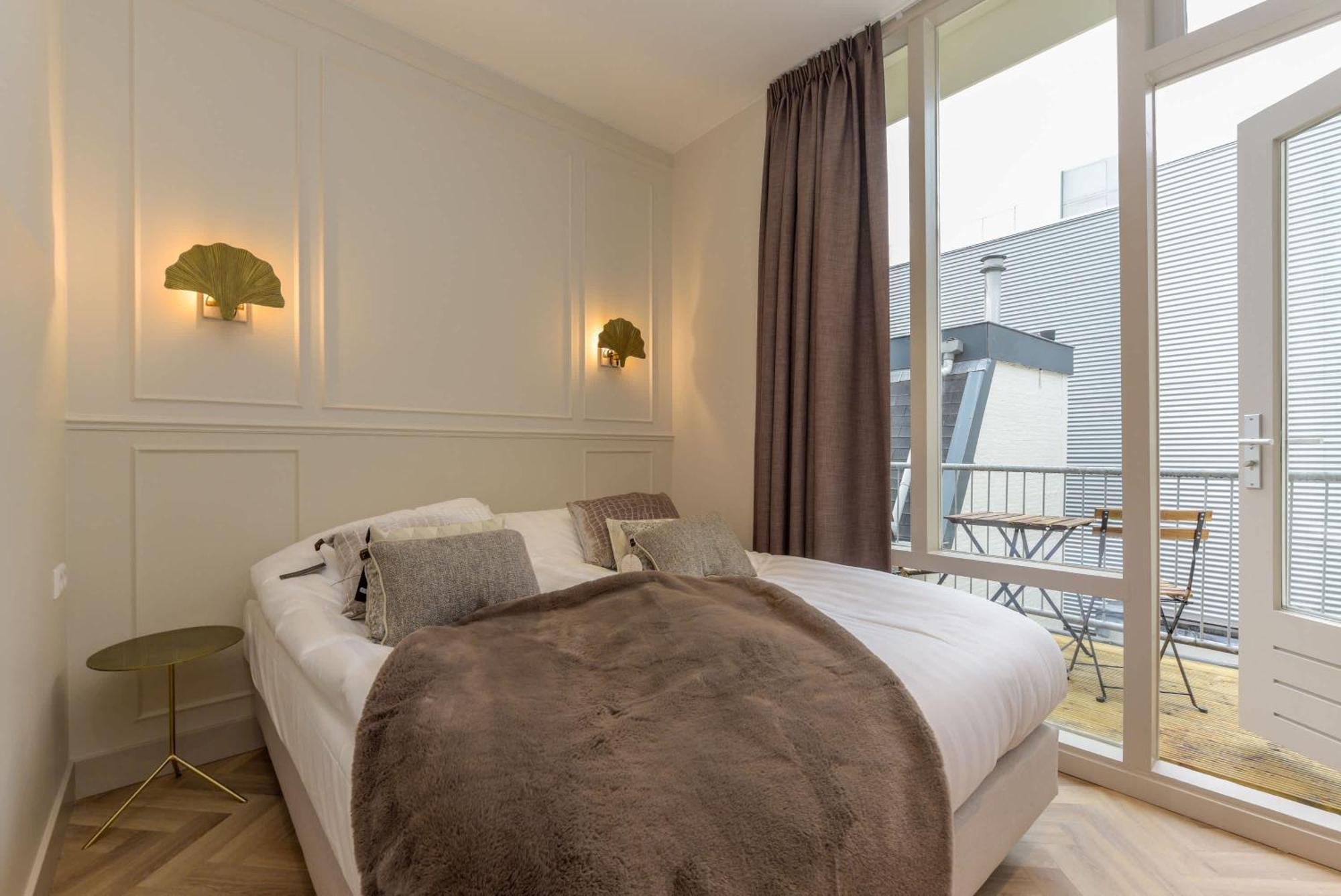 With Single Beds And Balcony *